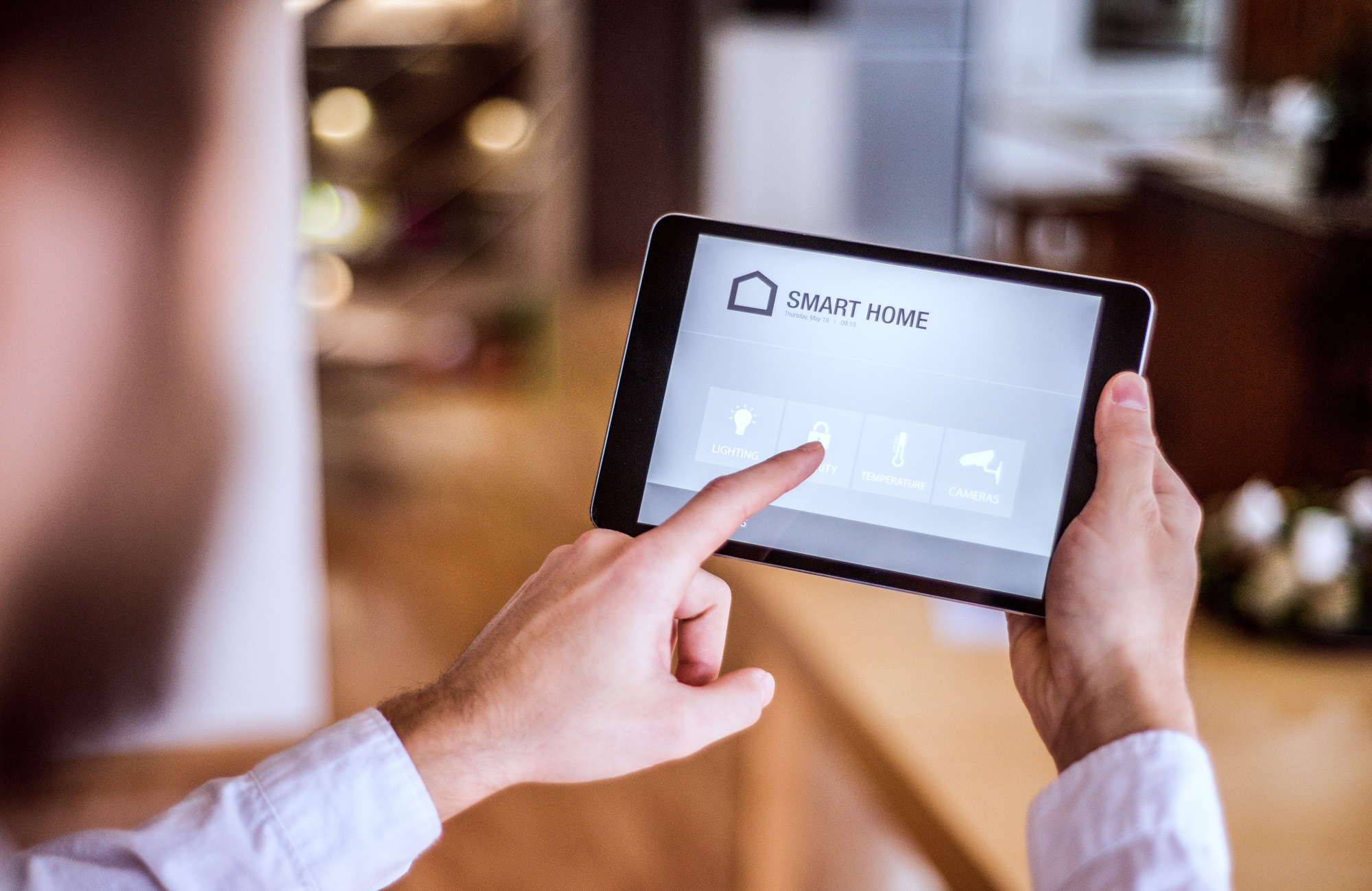 A tablet with smart home control system.